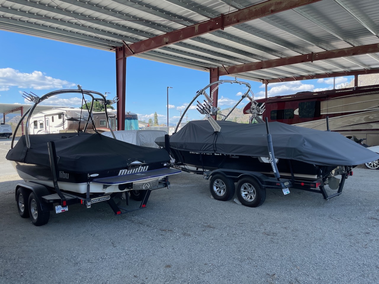 Two boats in a covered storage facility in Okanagan Falls